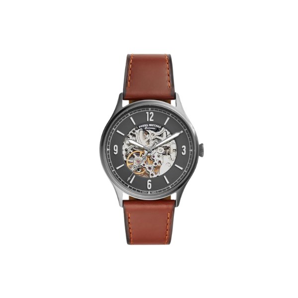 Reloj Fossil ME3178 con caja gris humo, esfera negra calada que deja ver el mecanismo y correa de cuero marrón, visto de frente