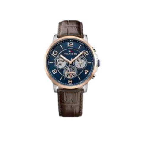 Reloj Tommy Hilfiger 1791290 con bisel en oro rosado y esfera azul con subesferas caladas, visto de frente